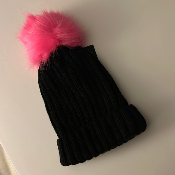 Black with neon pink puff ball beanie